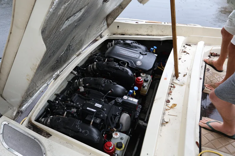  Yacht Photos Pics 2020 Chris-Craft 30 Launch engine compartment with open hatch, showing dual engines.
