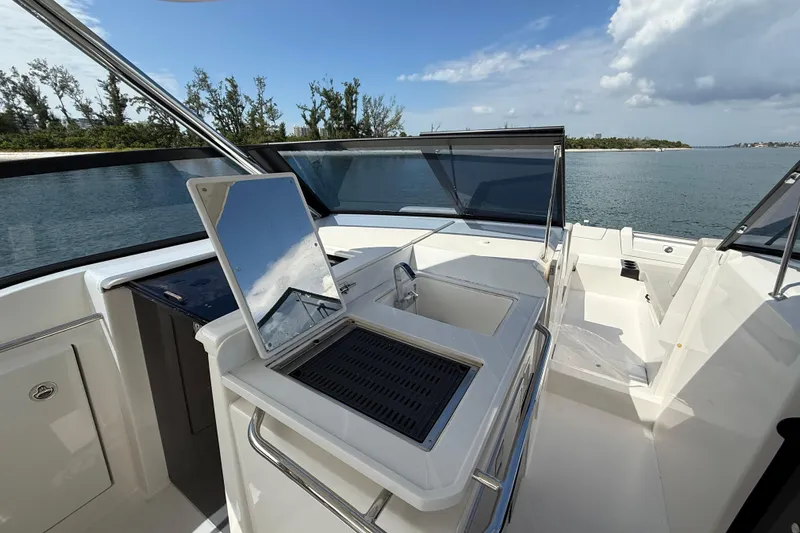  Yacht Photos Pics 2025 Aquila 32 Sport yacht interior with sleek design and modern amenities.