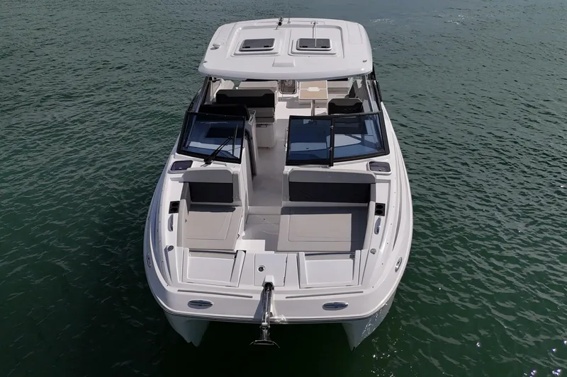  Yacht Photos Pics Aquila 32 Sport 2025 boat on water, aerial view, sleek design.