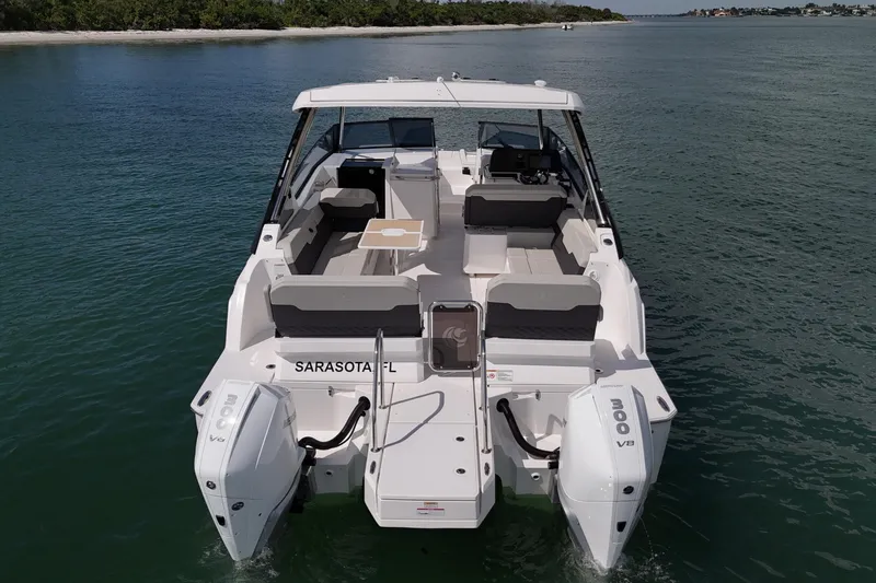  Yacht Photos Pics Aquila 32 Sport 2025 boat on calm water near Sarasota, Florida.