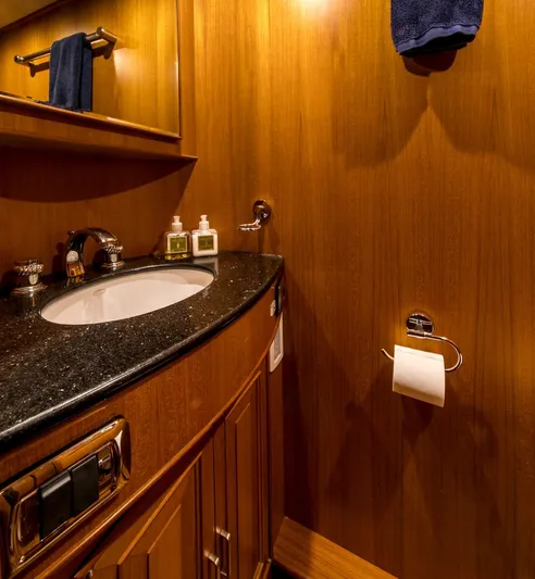 Perseus Yacht Photos Pics Luxurious wooden bathroom interior on a 2004 Fleming 75 yacht.