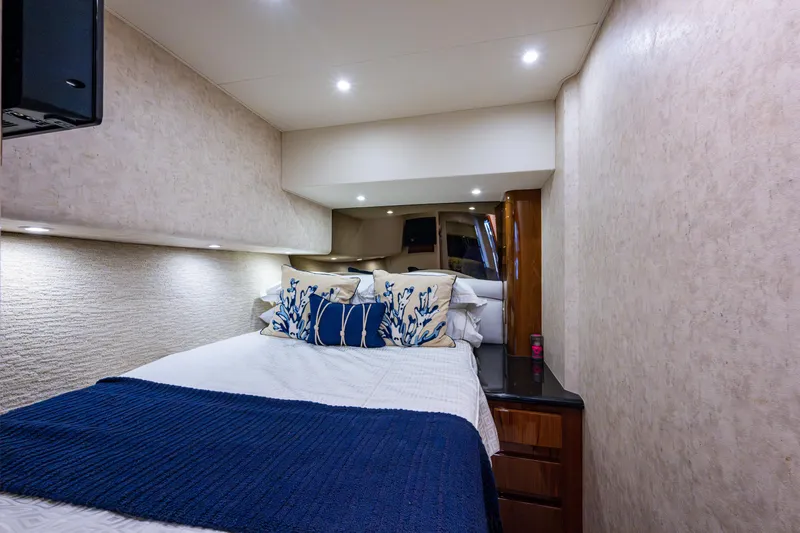 Miss Elena*eous Yacht Photos Pics Luxurious bedroom interior of 2004 Egg Harbor 43 Sport Fisherman yacht with elegant bedding.