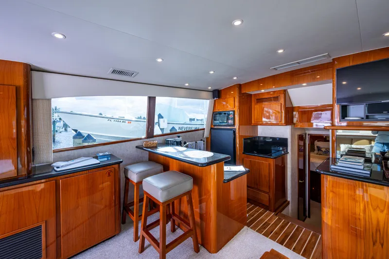 Miss Elena*eous Yacht Photos Pics Luxurious interior of 2004 Egg Harbor 43 Sport Fisherman yacht with modern amenities.