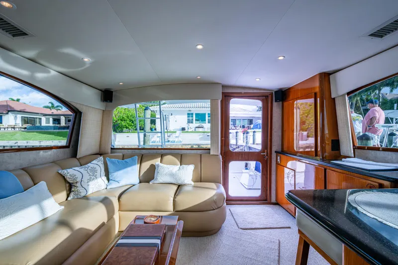 Miss Elena*eous Yacht Photos Pics Luxurious interior of 2004 Egg Harbor 43 Sport Fisherman yacht with plush seating and elegant decor.