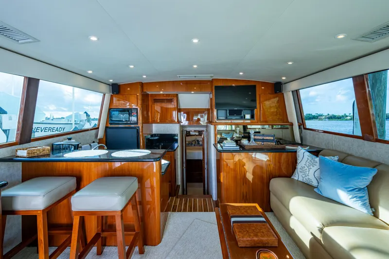 Miss Elena*eous Yacht Photos Pics Luxurious interior of 2004 Egg Harbor 43 Sport Fisherman yacht with elegant wood finishes.