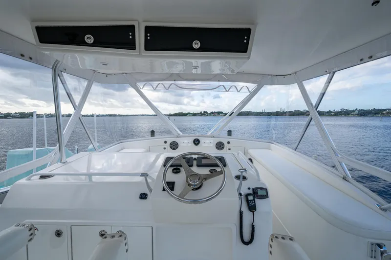 Miss Elena*eous Yacht Photos Pics 2004 Egg Harbor 43 Sport Fisherman helm with panoramic water view.