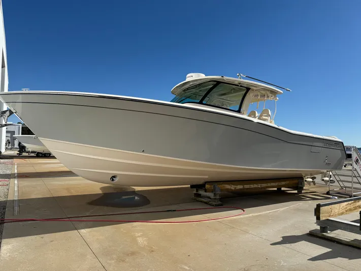  Yacht Photos Pics 2026 Grady-White Canyon 386 boat on a dock.