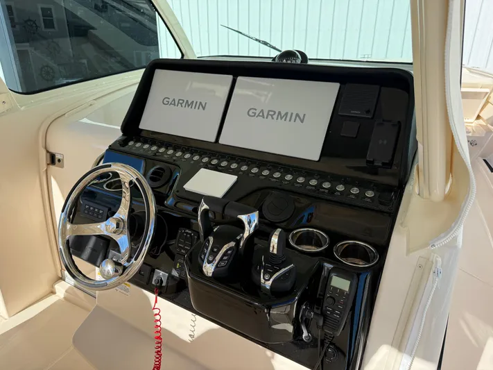  Yacht Photos Pics Grady-White Canyon 386 2026 helm with Garmin displays.