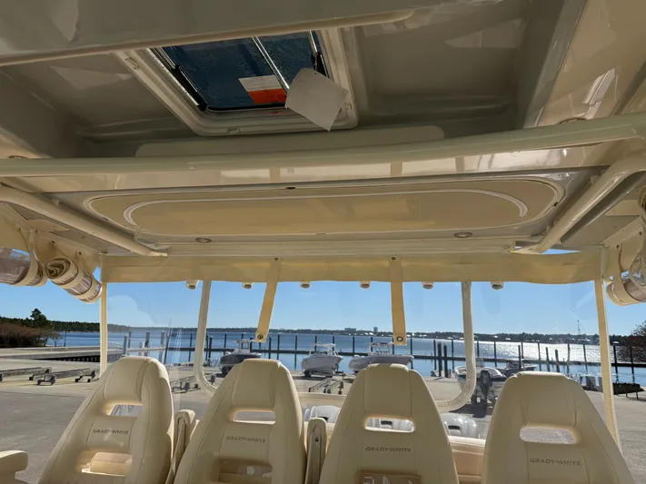  Yacht Photos Pics Interior of 2026 Grady-White Canyon 386 boat with scenic marina view.
