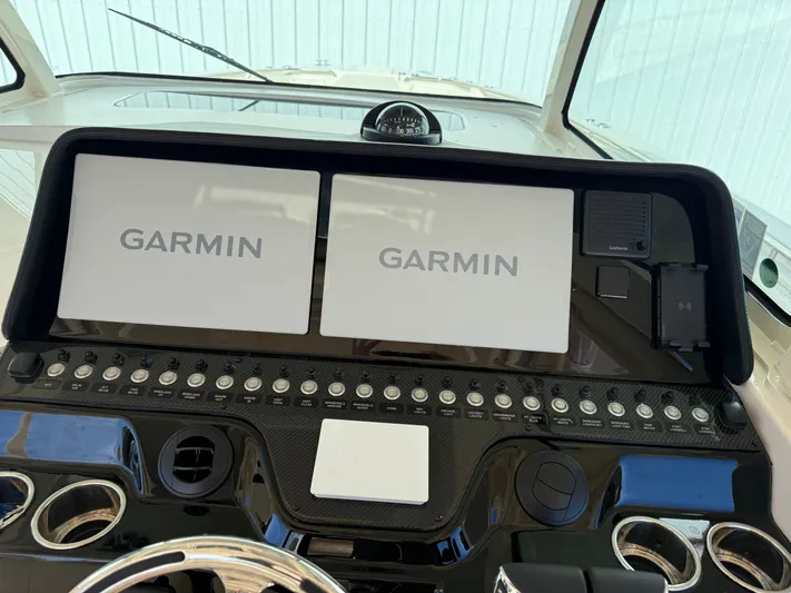  Yacht Photos Pics 2026 Grady-White Canyon 386 dashboard with Garmin displays.