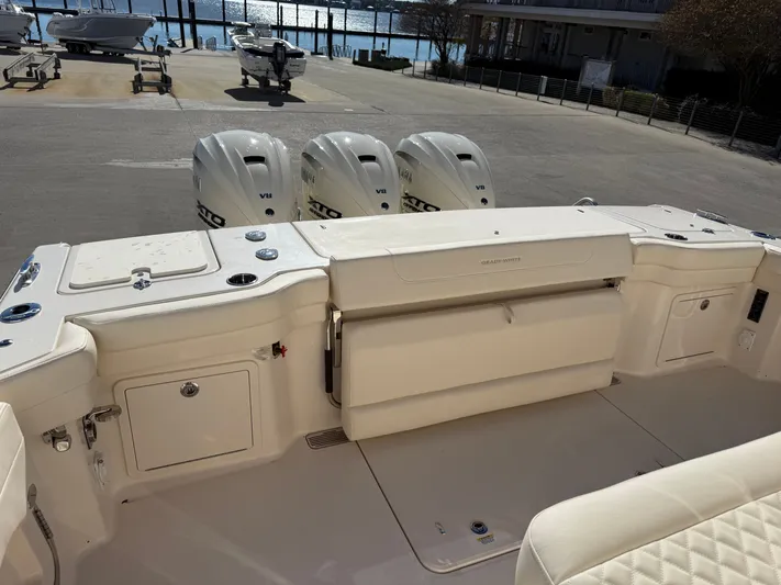  Yacht Photos Pics Grady-White Canyon 386 boat, 2026 model, with three V8 engines at dock.