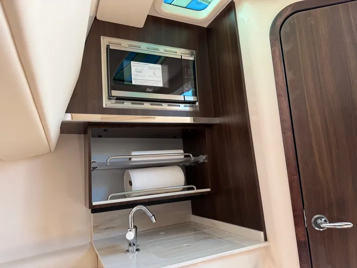  Yacht Photos Pics Interior of Grady-White Canyon 386 with microwave and sink, year 2026.
