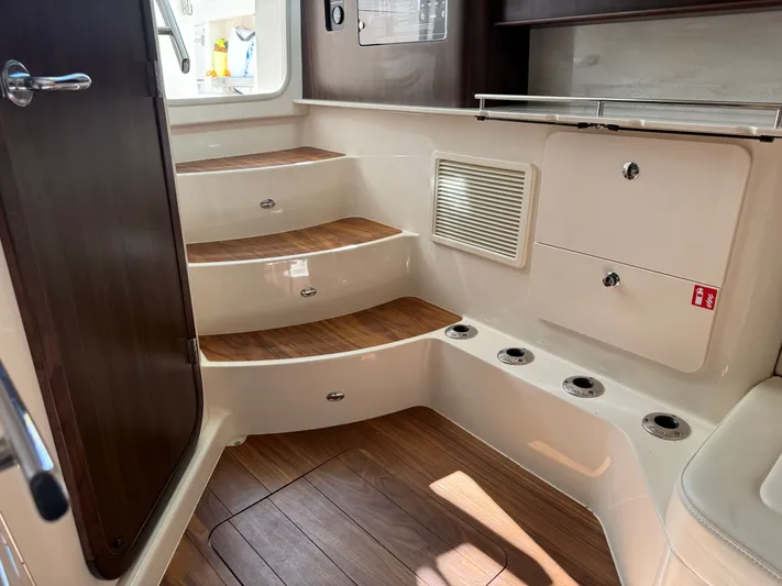  Yacht Photos Pics Interior of Grady-White Canyon 386 yacht, stairs and wood finish, year 2026.