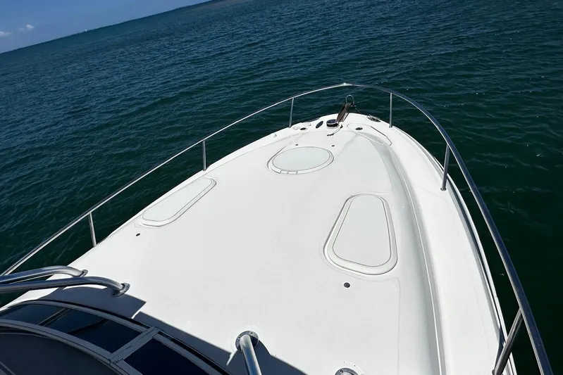  Yacht Photos Pics 2006 Hydra-Sports Vector 3300 VX boat deck on open water.