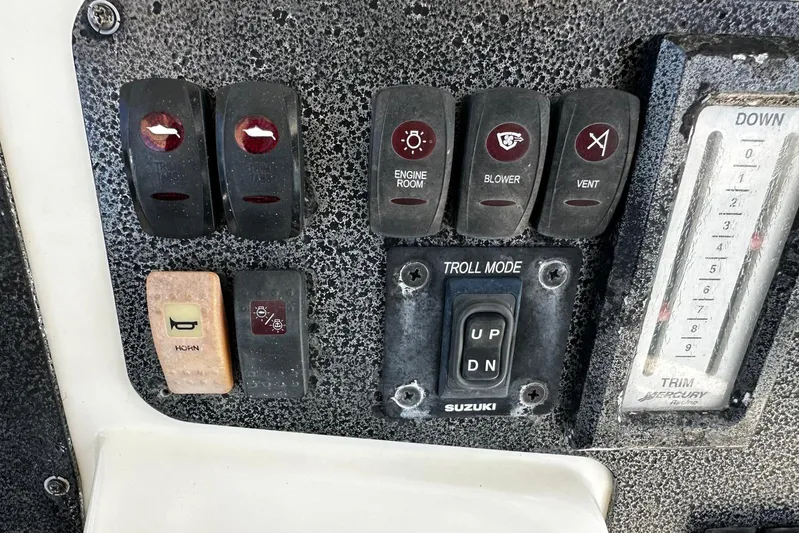  Yacht Photos Pics Control panel of a 2006 Hydra-Sports Vector 3300 VX boat with various switches.