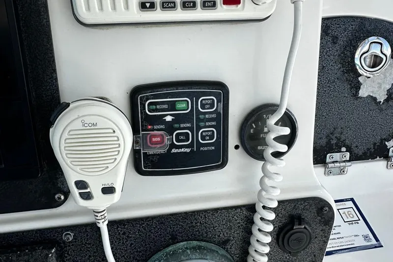  Yacht Photos Pics Control panel of a 2006 Hydra-Sports Vector 3300 VX boat with communication equipment.