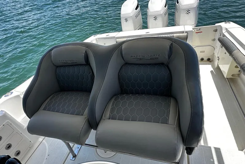  Yacht Photos Pics 2006 Hydra-Sports Vector 3300 VX boat seats with custom design, ocean background.