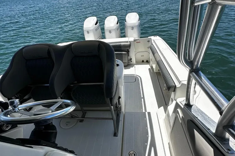  Yacht Photos Pics 2006 Hydra-Sports Vector 3300 VX boat interior with triple outboard engines.