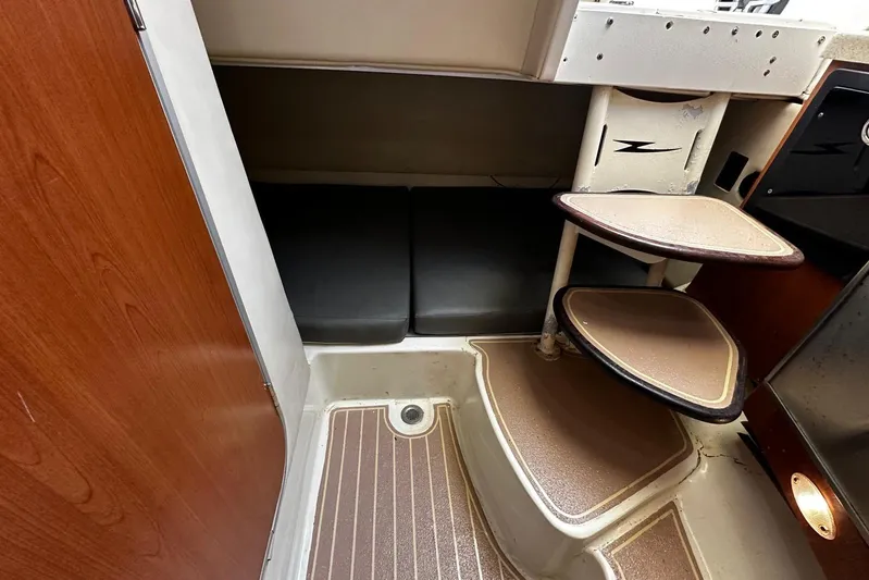  Yacht Photos Pics 2006 Hydra-Sports Vector 3300 VX cabin interior with steps and seating area.