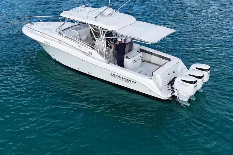  Yacht Photos Pics 2006 Hydra-Sports Vector 3300 VX boat on clear blue water.