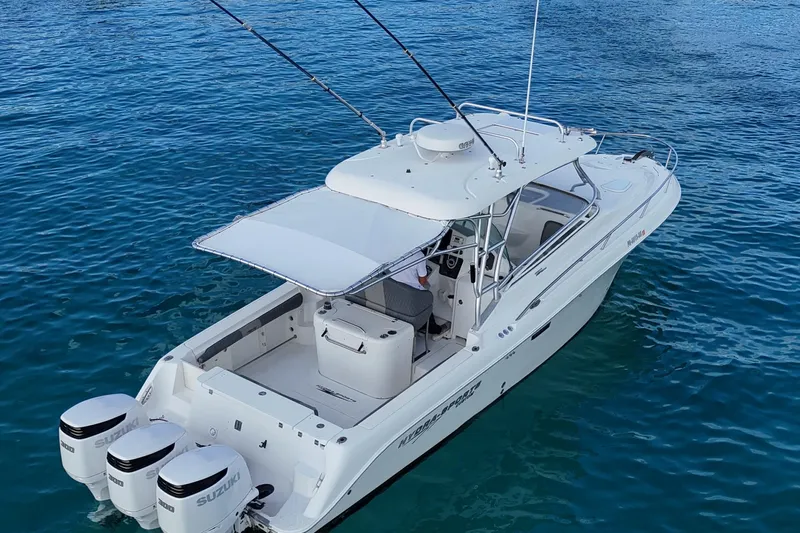  Yacht Photos Pics 2006 Hydra-Sports Vector 3300 VX boat on clear blue water.