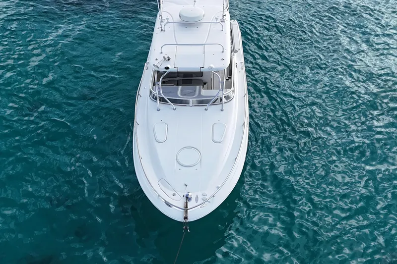  Yacht Photos Pics 2006 Hydra-Sports Vector 3300 VX boat on clear blue water, aerial view.