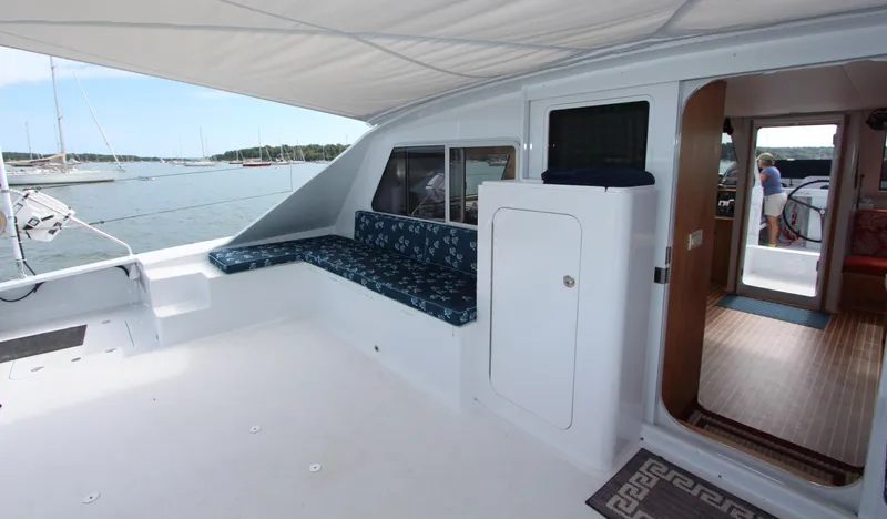 Saphira Yacht Photos Pics Spacious deck area of 2018 Chris White Atlantic 70 "SAPHIRA" yacht with seating and ocean view.