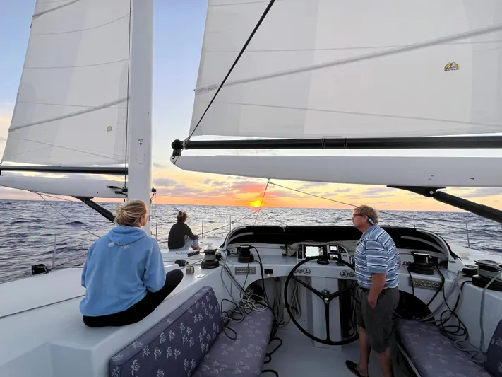 Saphira Yacht Photos Pics Sailing on Chris White Atlantic 70 "SAPHIRA" at sunset, 2018.