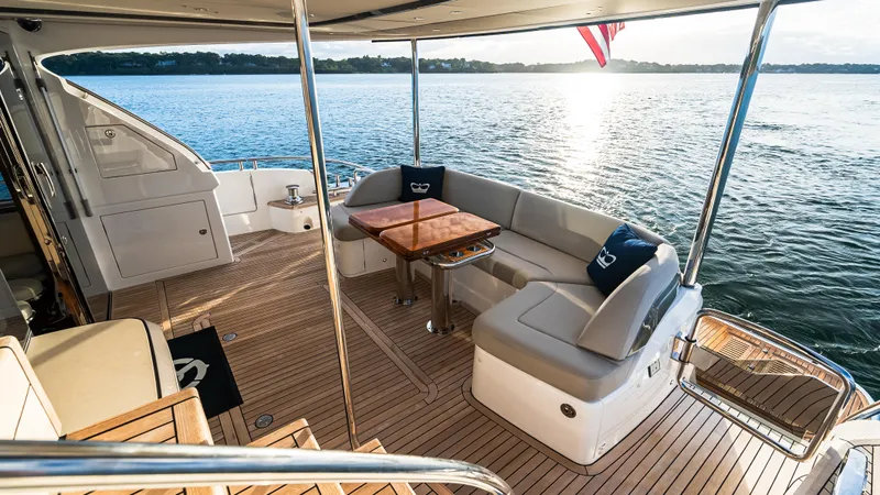 Stella Maris Yacht Photos Pics Luxurious 2022 Princess Y72 Motor Yacht deck with elegant seating and scenic water view.