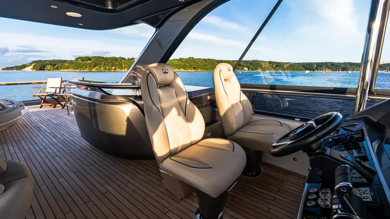 Stella Maris Yacht Photos Pics Luxurious 2022 Princess Y72 Motor Yacht interior with elegant seating and scenic ocean view.