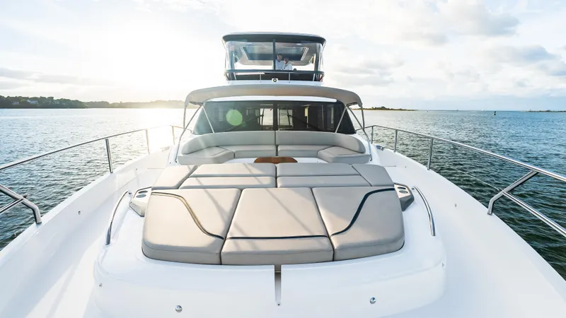 Stella Maris Yacht Photos Pics 2022 Princess Y72 Motor Yacht on serene water, showcasing luxurious deck seating.