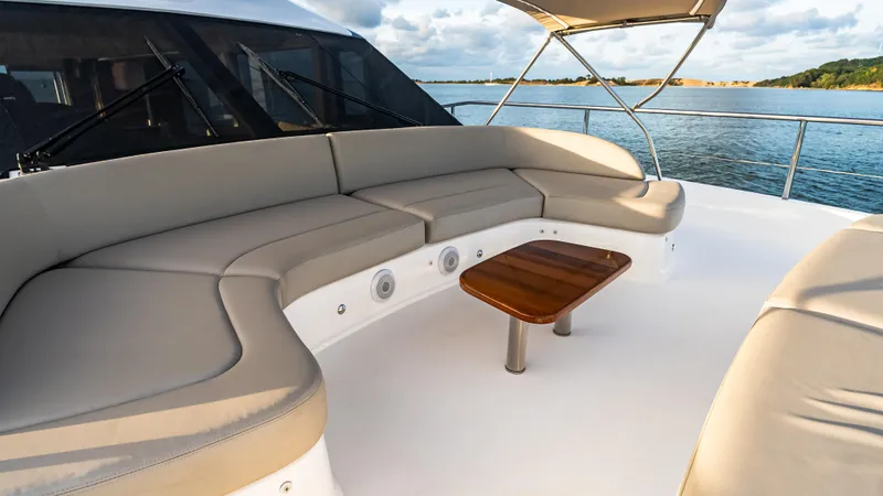 Stella Maris Yacht Photos Pics Luxurious seating area on 2022 Princess Y72 Motor Yacht, featuring elegant design and scenic views.