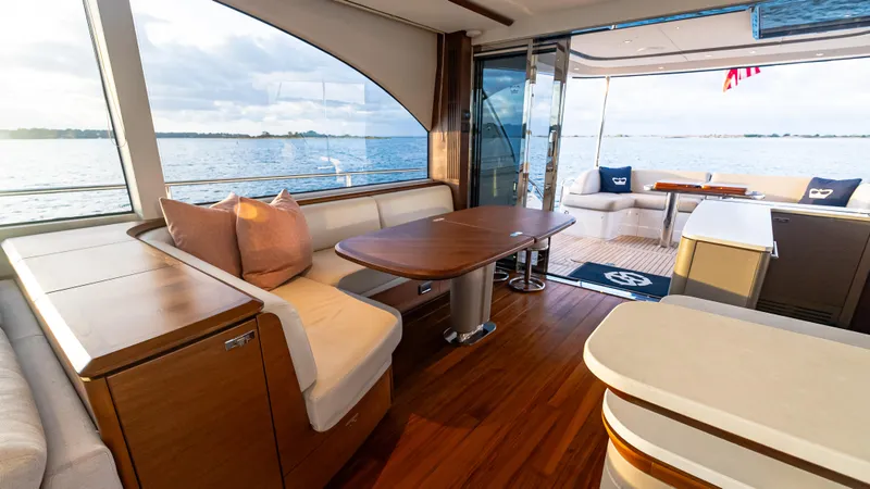 Stella Maris Yacht Photos Pics Luxurious interior of 2022 Princess Y72 Motor Yacht with elegant seating and ocean view.
