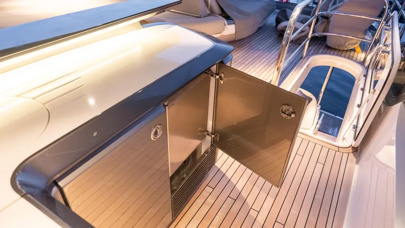 Stella Maris Yacht Photos Pics Luxurious 2022 Princess Y72 Motor Yacht deck with open storage compartment.