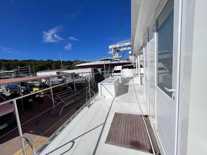 Yacht Photos Pics 2025 Catana Taino 21 Day Charter yacht docked under clear blue sky.