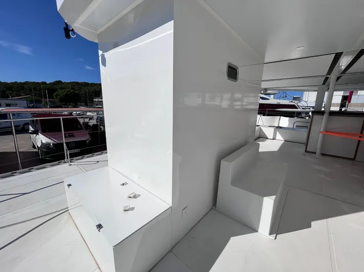  Yacht Photos Pics Modern Catana Taino 21 yacht deck with sleek white design, 2025 model.