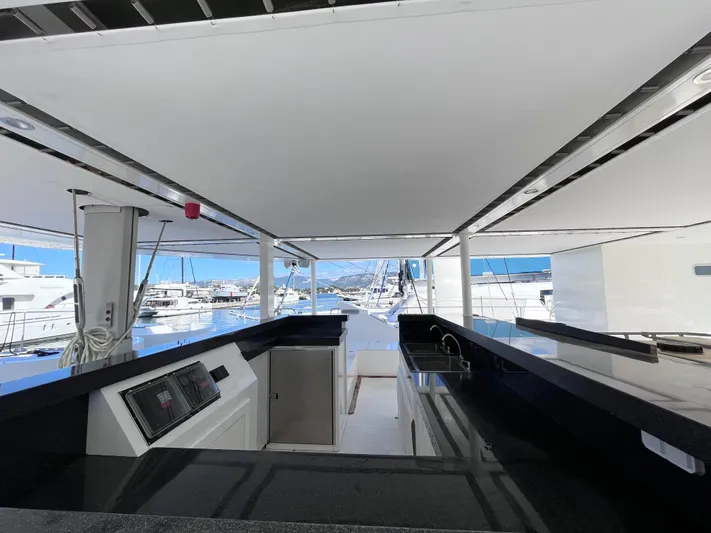  Yacht Photos Pics Modern Catana Taino 21 yacht interior with sleek design, docked at marina, 2025 model.