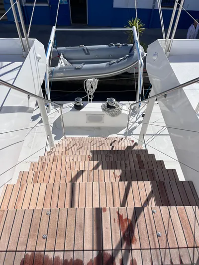  Yacht Photos Pics Staircase on Catana Taino 21 Day Charter yacht, 2025 model, with docked inflatable boat.
