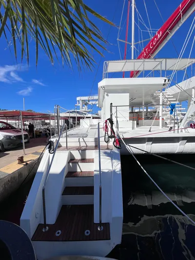  Yacht Photos Pics 2025 Catana Taino 21 Day Charter yacht docked under clear blue sky.