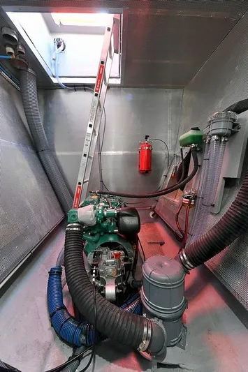  Yacht Photos Pics Engine room of 2025 Catana Taino 21 Day Charter with visible machinery and safety equipment.