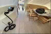 2007 Azimut 68E yacht deck with seating area and table.