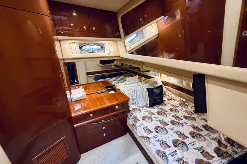 Rogue One Yacht Photos Pics Luxurious cabin interior of 2003 Sea Ray 560 Sedan Bridge yacht.