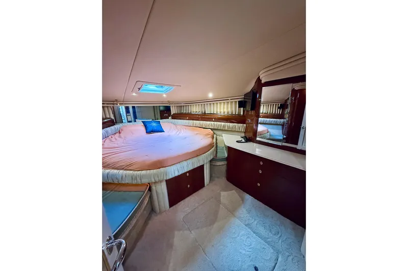 Rogue One Yacht Photos Pics Luxurious cabin interior of 2003 Sea Ray 560 Sedan Bridge yacht.