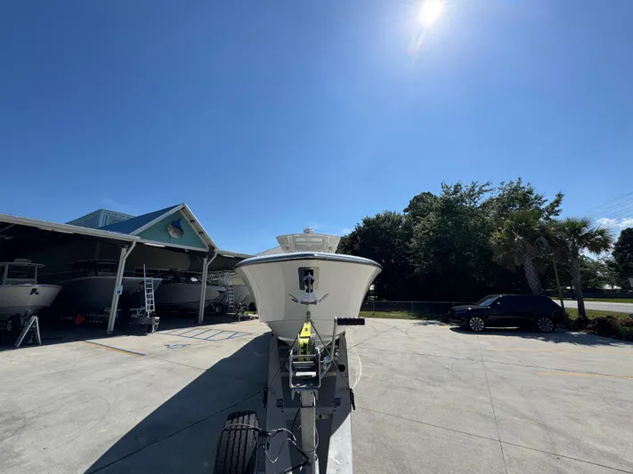 Yacht Photos Pics 2020 Invincible 39 Open Fisherman boat on trailer under clear blue sky.