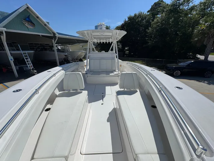  Yacht Photos Pics 2020 Invincible 39 Open Fisherman boat with spacious seating and sleek design.