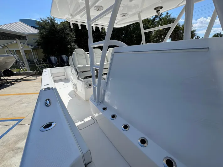  Yacht Photos Pics 2020 Invincible 39 Open Fisherman boat interior with seating and rod holders.