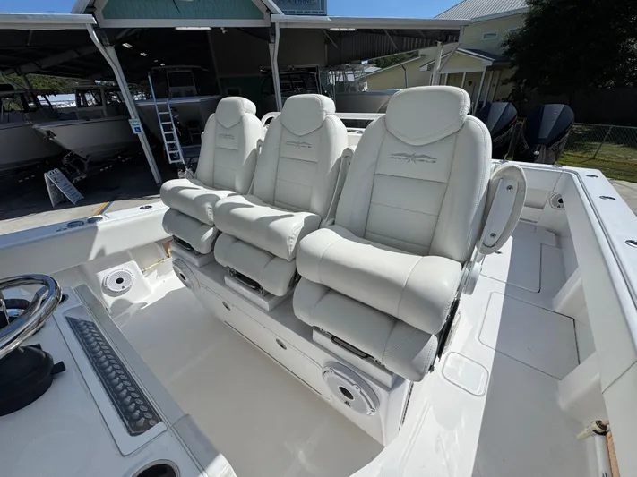  Yacht Photos Pics 2020 Invincible 39 Open Fisherman boat with luxurious white seating.