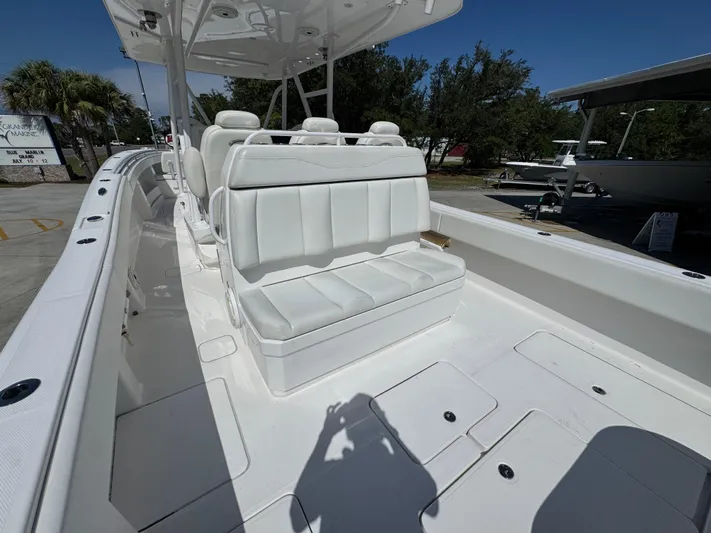  Yacht Photos Pics 2020 Invincible 39 Open Fisherman boat with white seating and spacious deck.