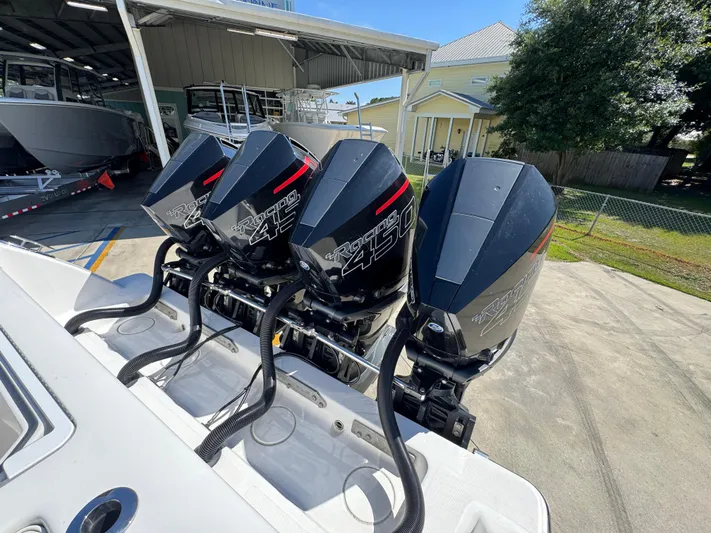  Yacht Photos Pics Four powerful outboard engines on a 2020 Invincible 39 Open Fisherman boat.