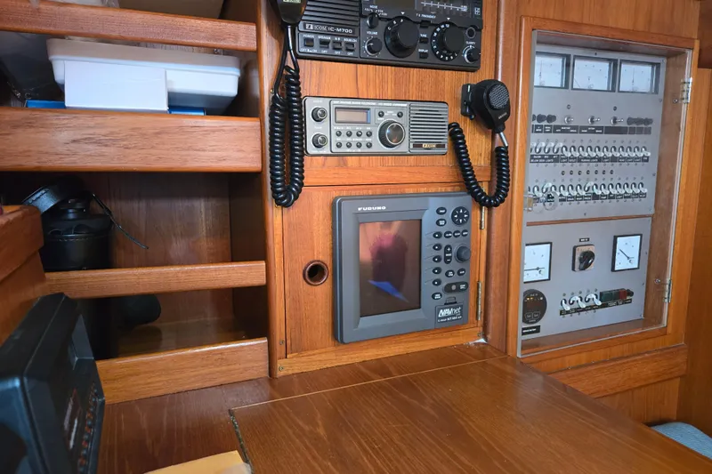 Name Reserved Yacht Photos Pics Navigation and communication equipment on a 1985 Swan 46 yacht control panel.